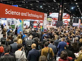 Scientific Sessions attendees head into the Science and Technology hall to see the exhibits.