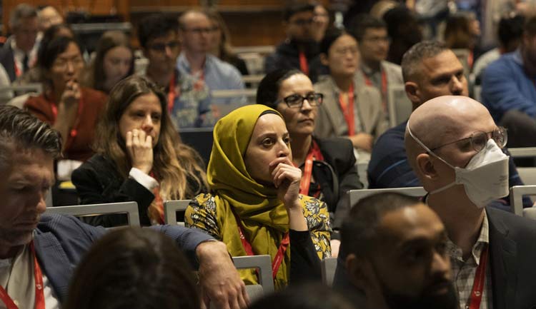Audience members listen carefully to a presentation during Vascular Discovery 2023.