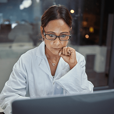 Woman reading from the computer