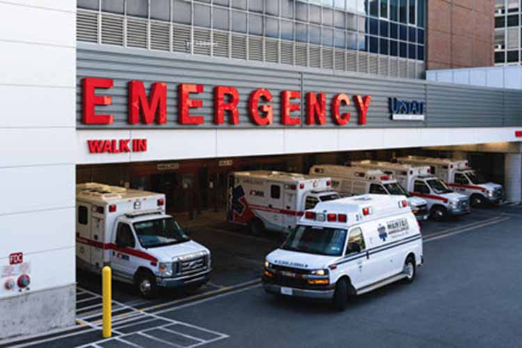 Emergency vehicles waiting for a call outside an emergency hospital