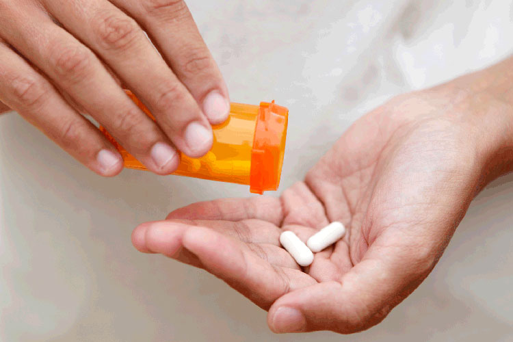 medicines in hand