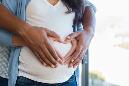 multiethnic couple expecting a baby
