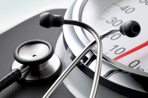 Bathroom scale with stethoscope.