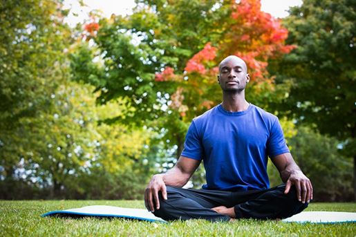 young man exercising yoga