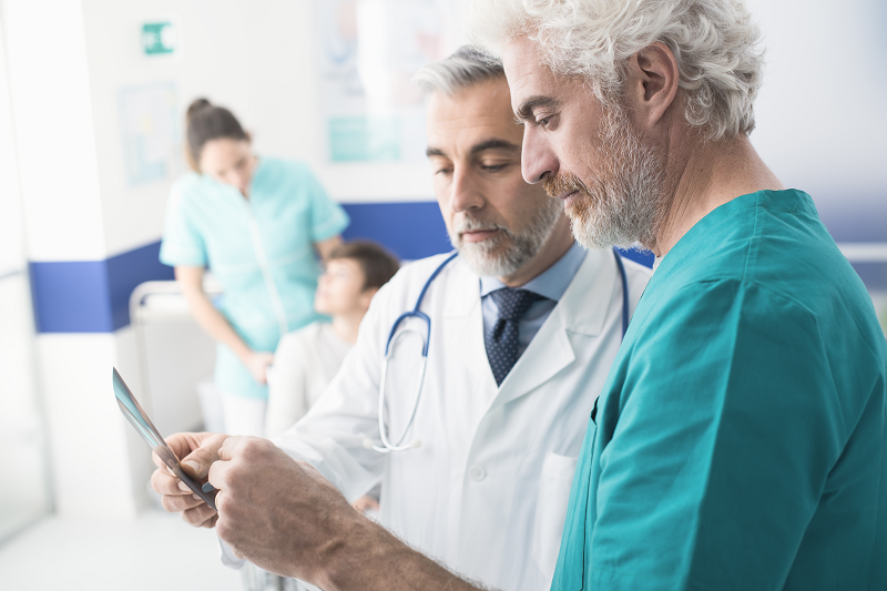 Medical Professionals Conferring over an image